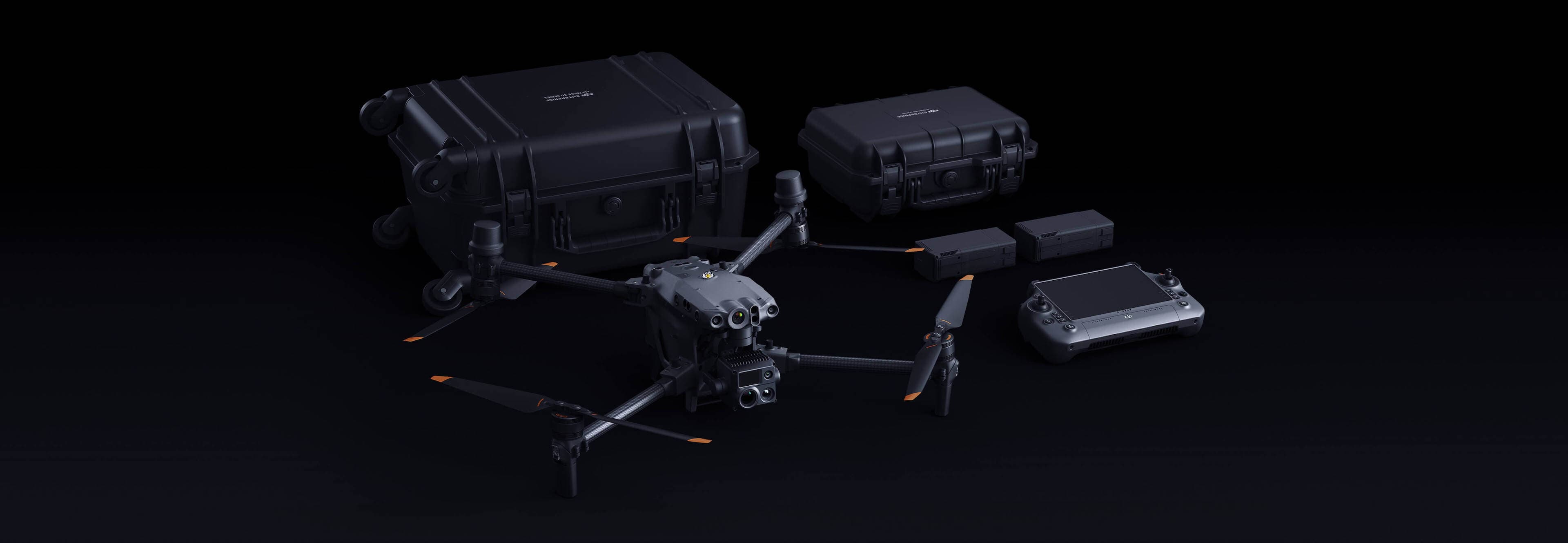 Kompletan set opreme na crnoj pozadini: dron sa payloadom, transportni koferi, rezervne baterije i RC Plus kontroler
